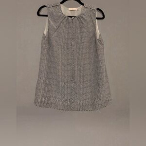 Tory Burch sleeveless blouse in a black and white micro-chevron print.